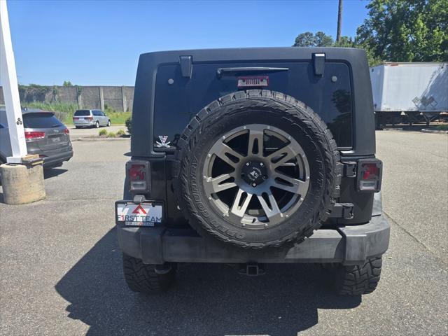 used 2015 Jeep Wrangler Unlimited car, priced at $25,500