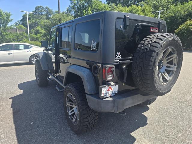 used 2015 Jeep Wrangler Unlimited car, priced at $25,500