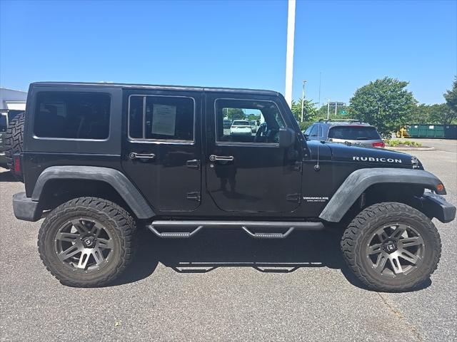 used 2015 Jeep Wrangler Unlimited car, priced at $25,500