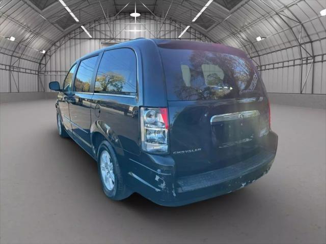 used 2010 Chrysler Town & Country car, priced at $2,450