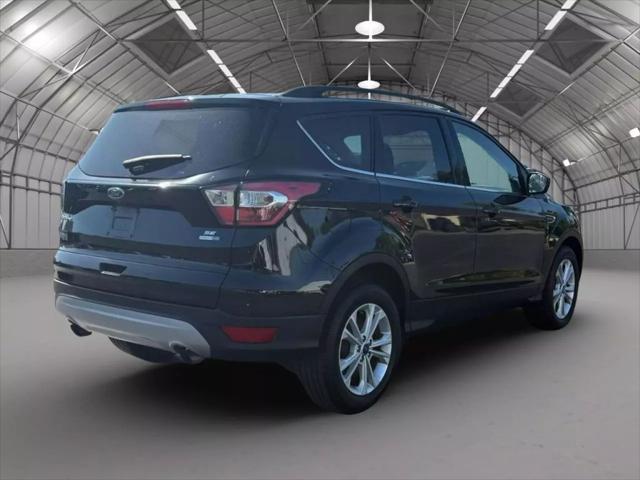 used 2018 Ford Escape car, priced at $13,495