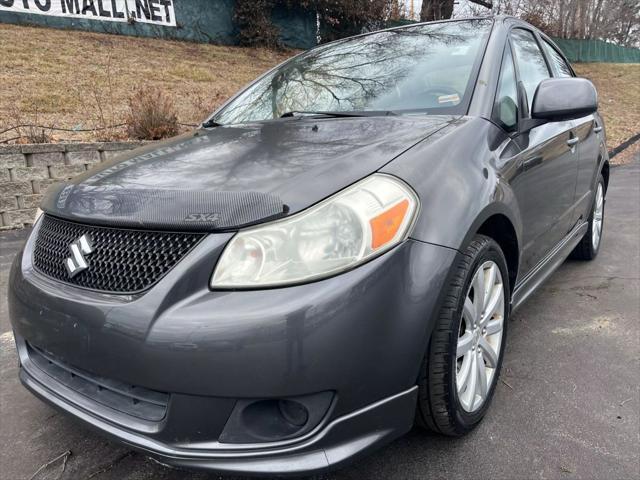 used 2010 Suzuki SX4 car, priced at $6,995