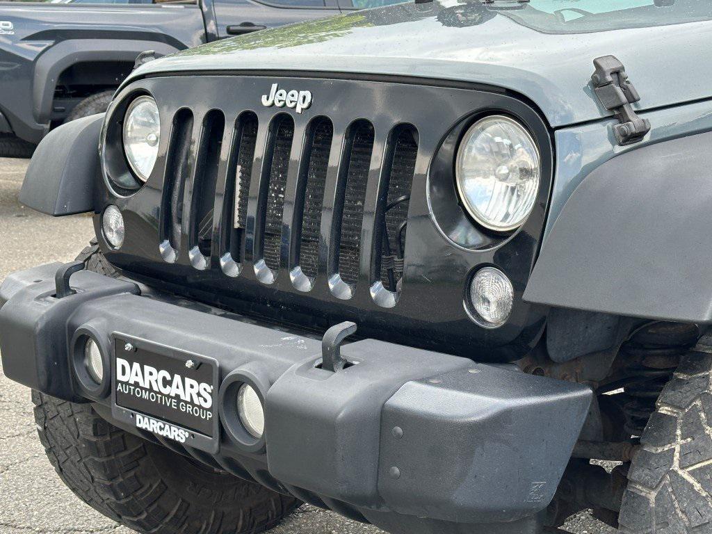 used 2014 Jeep Wrangler Unlimited car, priced at $14,490