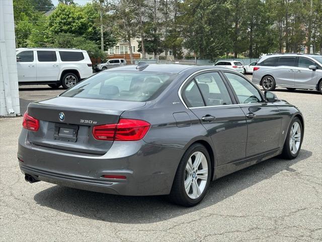 used 2018 BMW 330e car, priced at $15,990