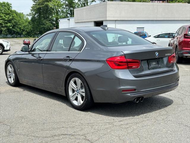 used 2018 BMW 330e car, priced at $15,990