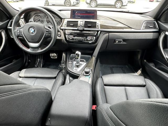 used 2018 BMW 330e car, priced at $15,990