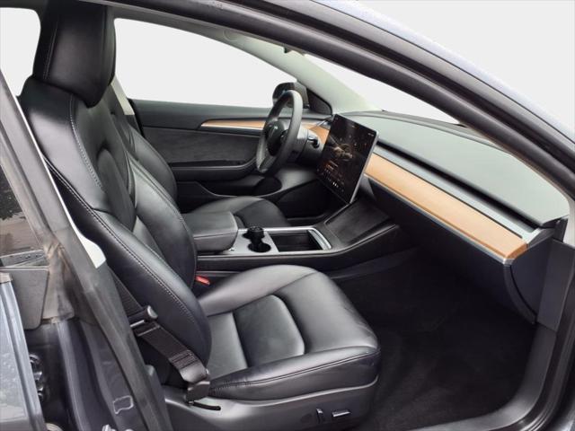 used 2023 Tesla Model 3 car, priced at $25,500