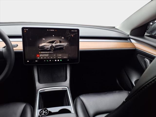 used 2023 Tesla Model 3 car, priced at $25,500