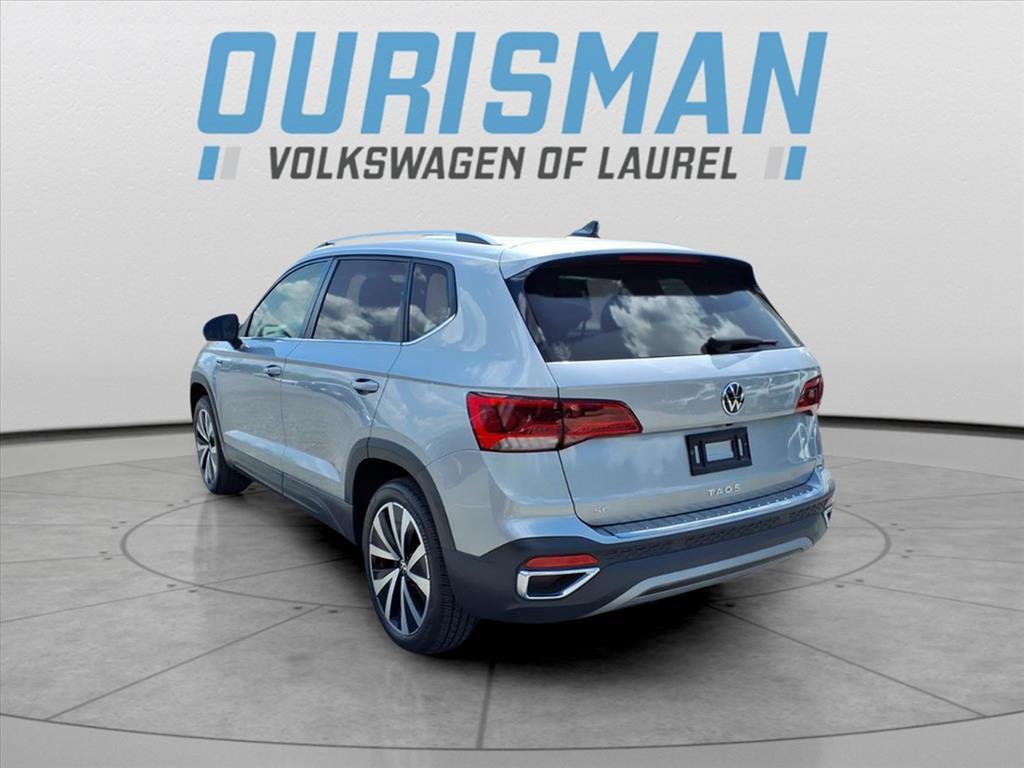 used 2023 Volkswagen Taos car, priced at $22,500