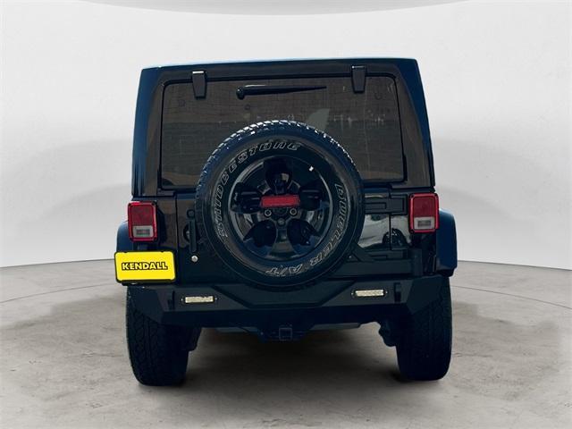 used 2015 Jeep Wrangler Unlimited car, priced at $19,591