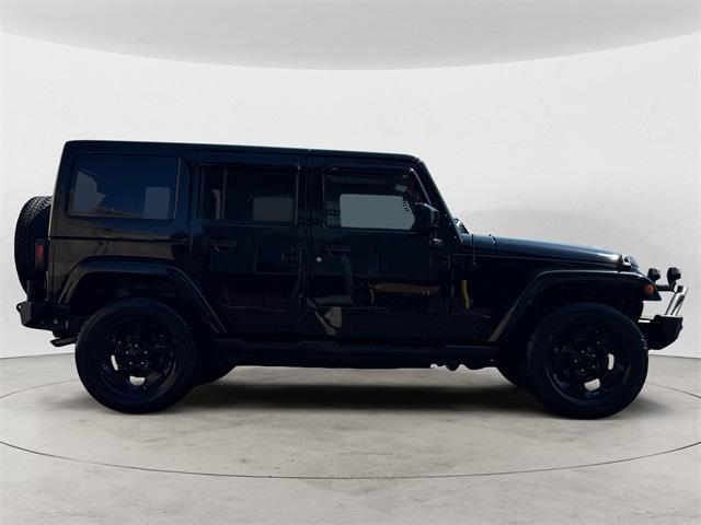 used 2015 Jeep Wrangler Unlimited car, priced at $19,591
