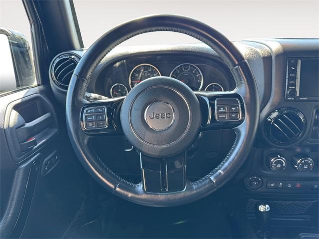 used 2015 Jeep Wrangler Unlimited car, priced at $19,591