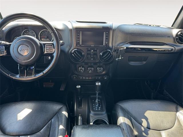 used 2015 Jeep Wrangler Unlimited car, priced at $19,591