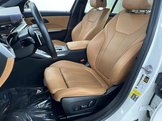 used 2024 BMW 330e car, priced at $32,300