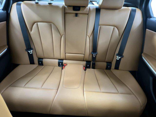 used 2024 BMW 330e car, priced at $32,300