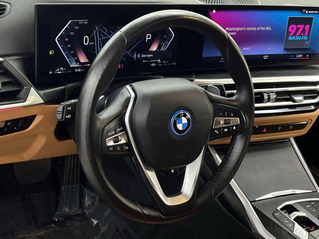 used 2024 BMW 330e car, priced at $32,300