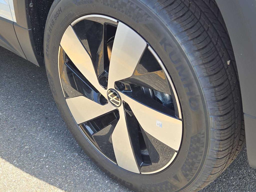 new 2025 Volkswagen Taos car, priced at $27,176
