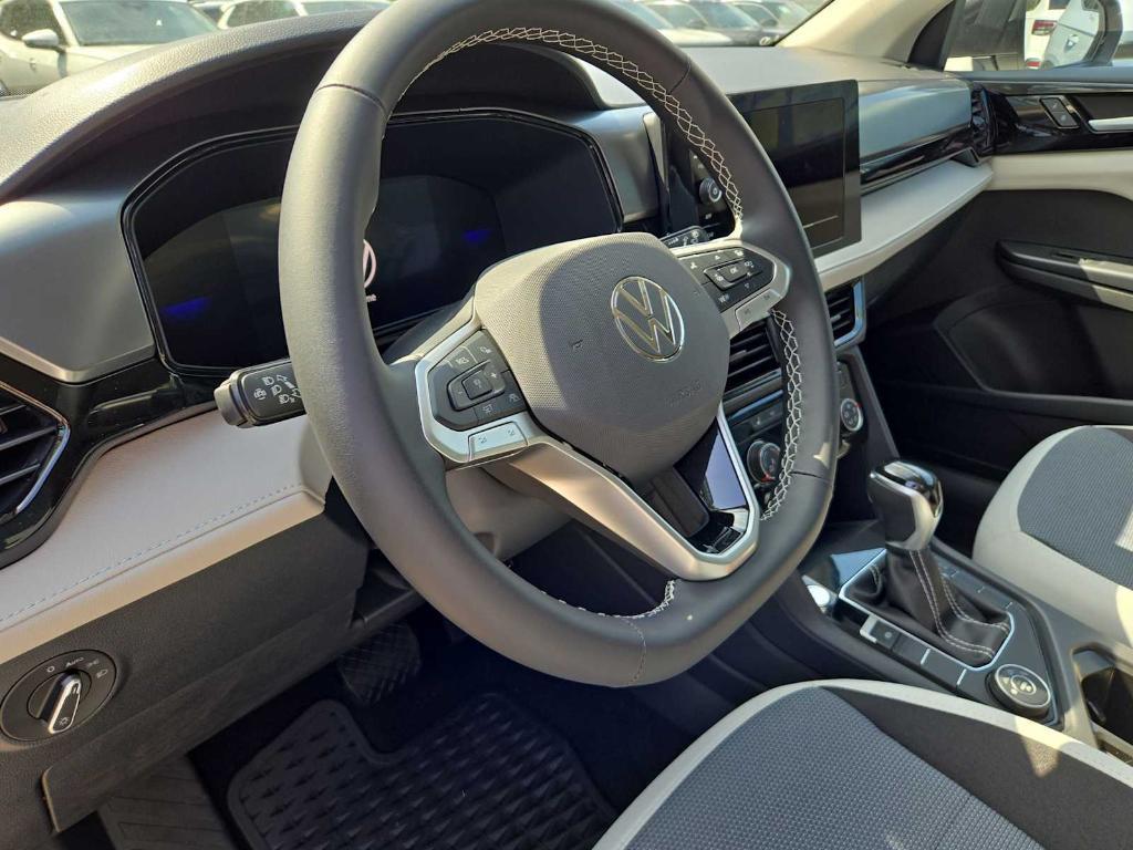 new 2025 Volkswagen Taos car, priced at $27,176