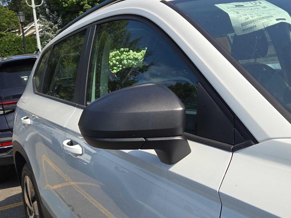 new 2025 Volkswagen Taos car, priced at $27,176