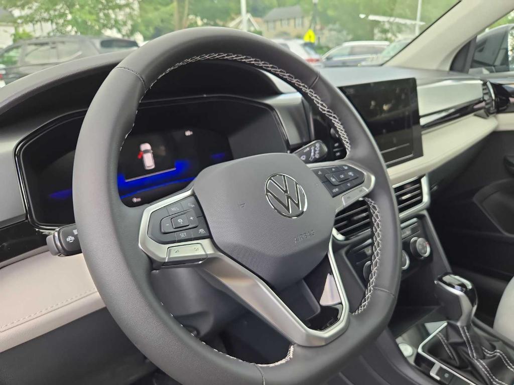 new 2025 Volkswagen Taos car, priced at $26,692