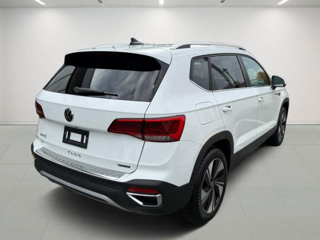 used 2023 Volkswagen Taos car, priced at $23,495