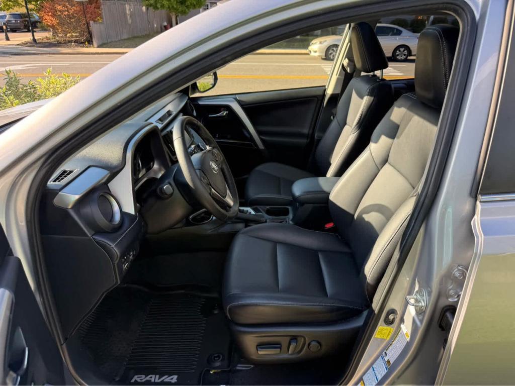 used 2018 Toyota RAV4 Hybrid car, priced at $23,995