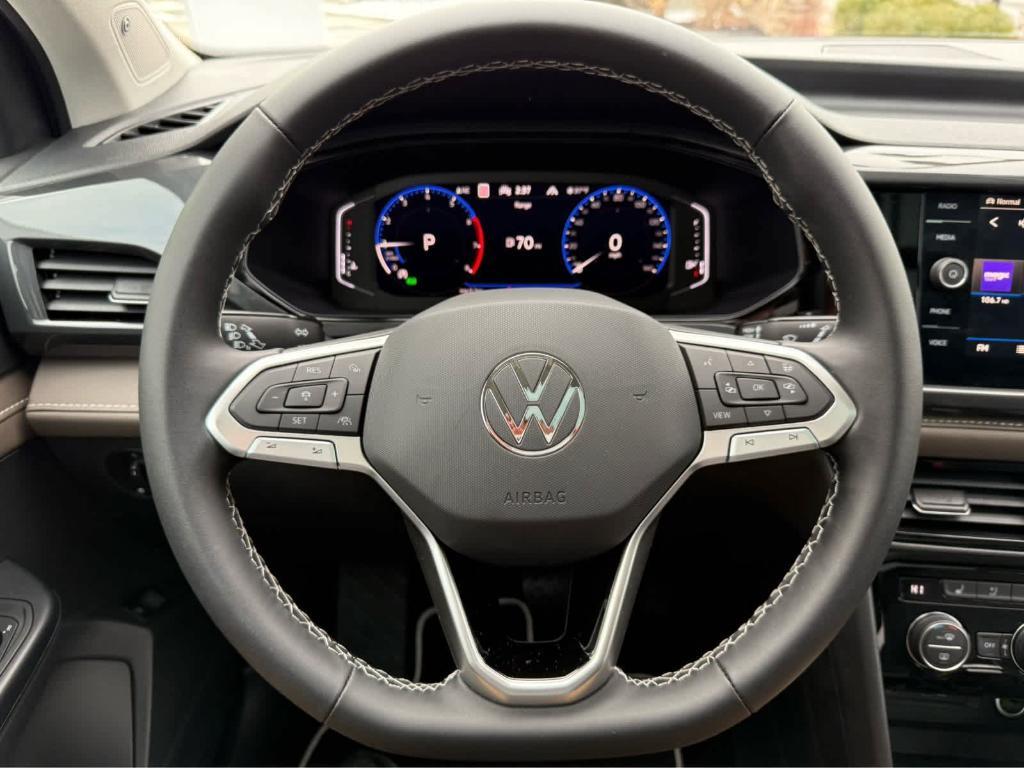 used 2023 Volkswagen Taos car, priced at $27,995