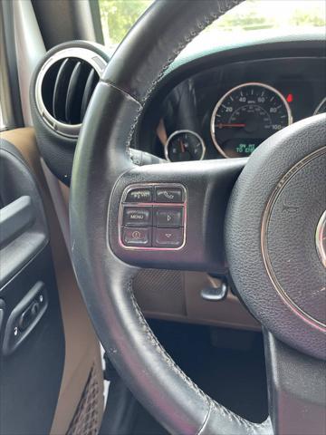 used 2015 Jeep Wrangler Unlimited car, priced at $18,888