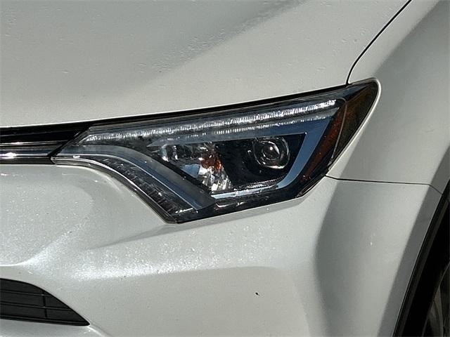 used 2018 Toyota RAV4 Hybrid car, priced at $20,480