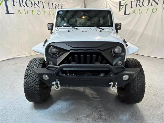 used 2015 Jeep Wrangler Unlimited car, priced at $24,398