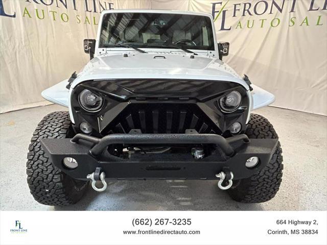 used 2015 Jeep Wrangler Unlimited car, priced at $21,398