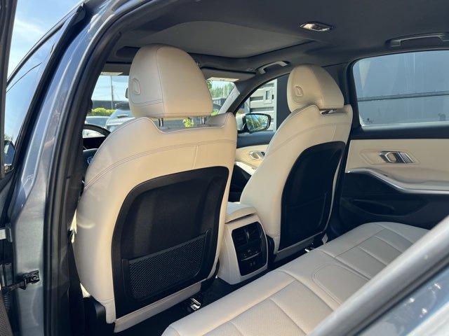 used 2023 BMW 330e car, priced at $38,486