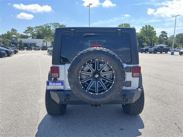 used 2016 Jeep Wrangler Unlimited car, priced at $25,880