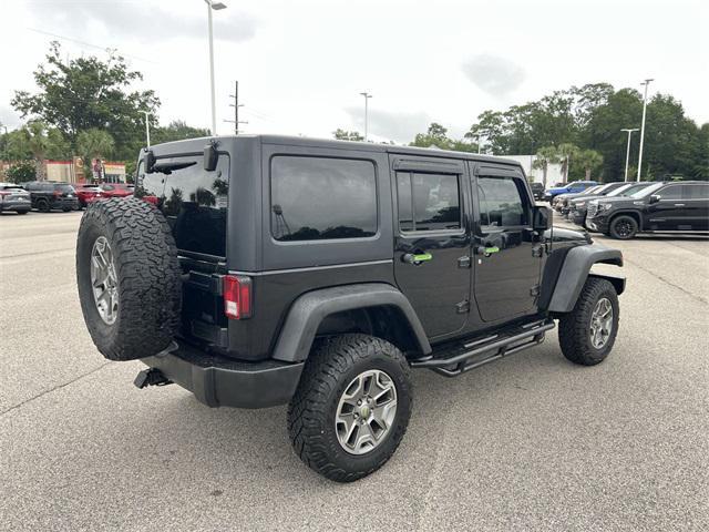 used 2015 Jeep Wrangler Unlimited car, priced at $19,680
