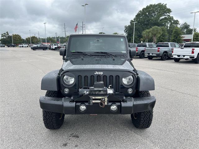 used 2015 Jeep Wrangler Unlimited car, priced at $19,680