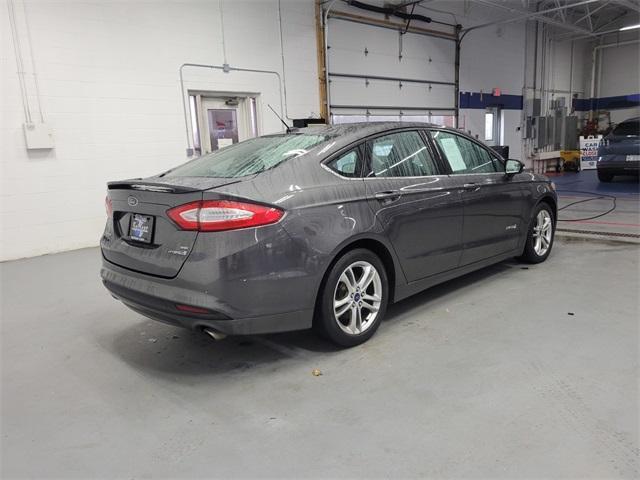 used 2015 Ford Fusion Hybrid car, priced at $10,562