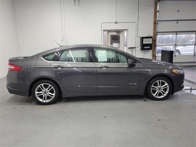 used 2015 Ford Fusion Hybrid car, priced at $10,562