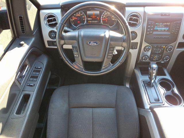 used 2014 Ford F-150 car, priced at $17,623