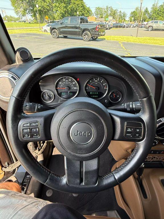 used 2014 Jeep Wrangler Unlimited car, priced at $15,295
