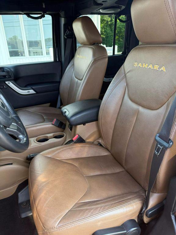 used 2014 Jeep Wrangler Unlimited car, priced at $15,295