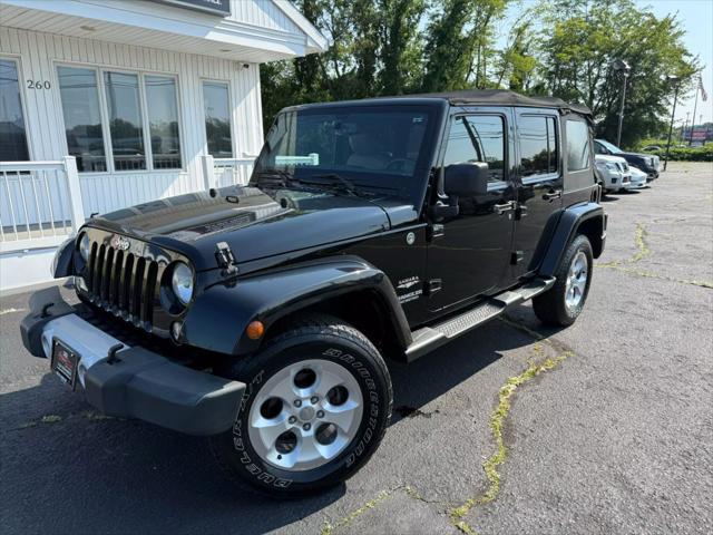 used 2014 Jeep Wrangler Unlimited car, priced at $15,445