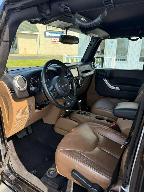 used 2014 Jeep Wrangler Unlimited car, priced at $15,295