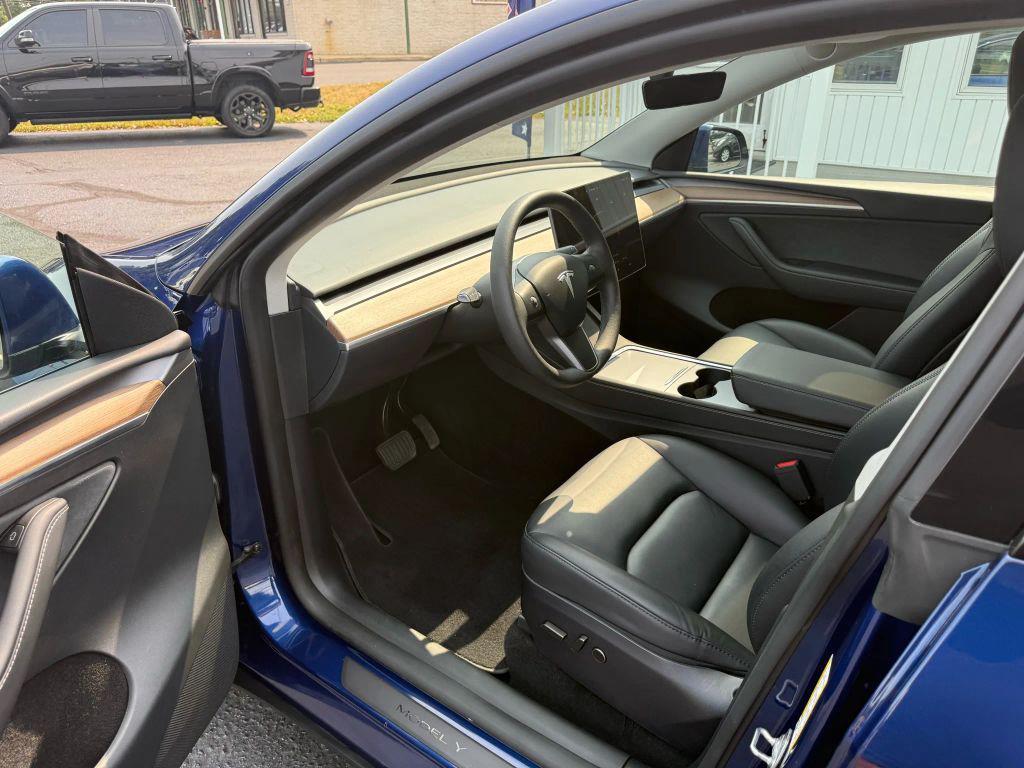 used 2024 Tesla Model Y car, priced at $33,995