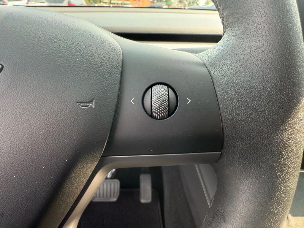 used 2024 Tesla Model Y car, priced at $33,995