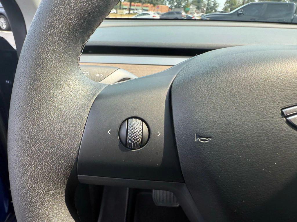 used 2024 Tesla Model Y car, priced at $33,995
