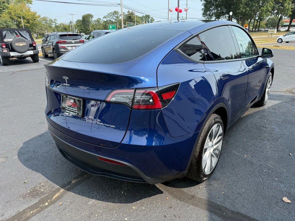 used 2024 Tesla Model Y car, priced at $33,995