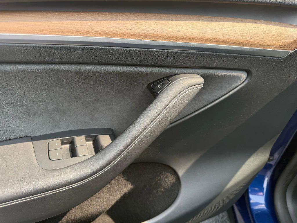 used 2024 Tesla Model Y car, priced at $33,995