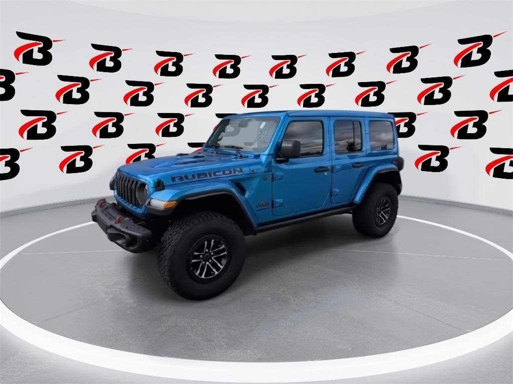 used 2024 Jeep Wrangler car, priced at $55,900