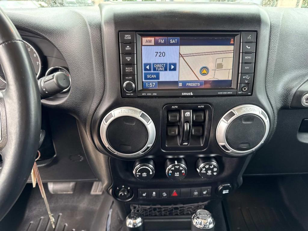 used 2015 Jeep Wrangler Unlimited car, priced at $19,488