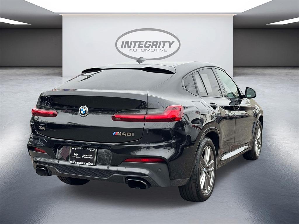 used 2021 BMW X4 car, priced at $36,498